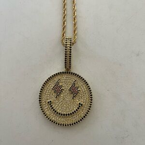 Large gold tone like new faux rhinestone smile face necklace